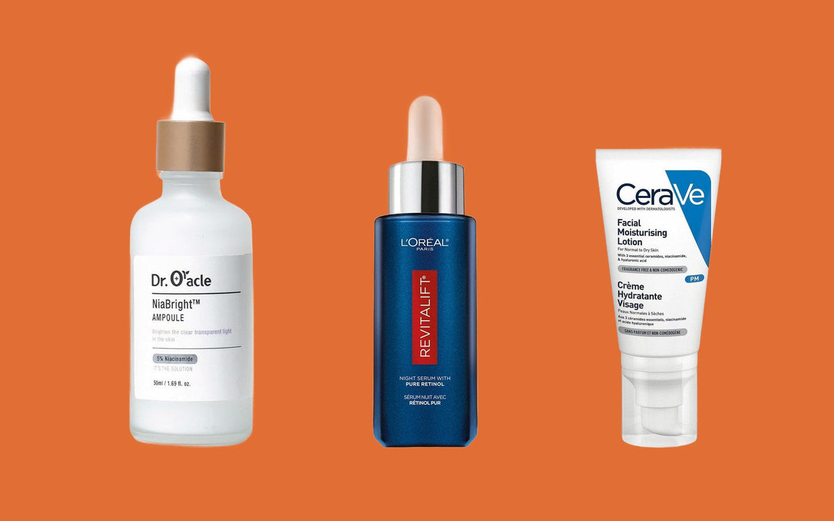 Dr.Oracle NiaBright Ampoule, L'Oréal Revitalift Pure Retinol natserum og CeraVe Facial Moisturising Lotion på orange baggrund