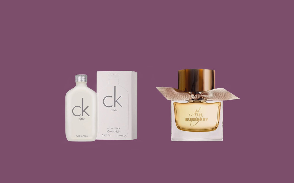 Calvin Klein CK One eau de toilette med æske og Burberry My Burberry eau de parfum på blommefarvet baggrund