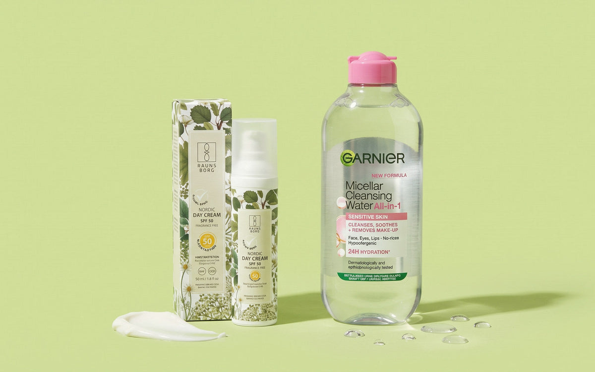 Raunsborg Nordic Day Cream SPF 50 med æske og Garnier micellarvand til sensitiv hud på lysegrøn baggrund