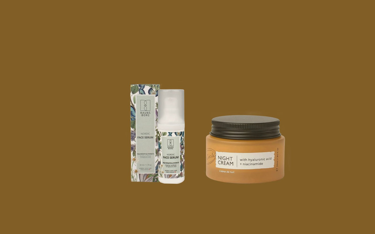 Raunsborg Nordic Face Serum med æske ved siden af en UpCircle natcreme i krukke på okkerfarvet baggrund